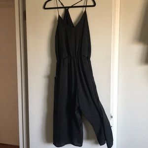 Black faux silk romper with pockets